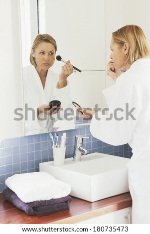 Woman making up