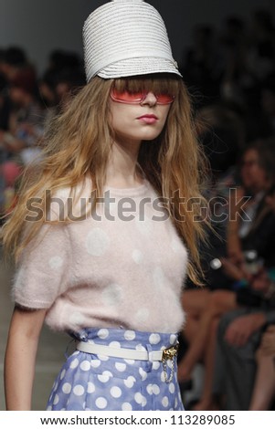 NEW YORK, NY - SEPTEMBER 10: A model walks the runway at the Karen Walker Spring Summer 2013 fashion show during Mercedes-Benz Fashion Week on September 10, 2012 in New York City, USA