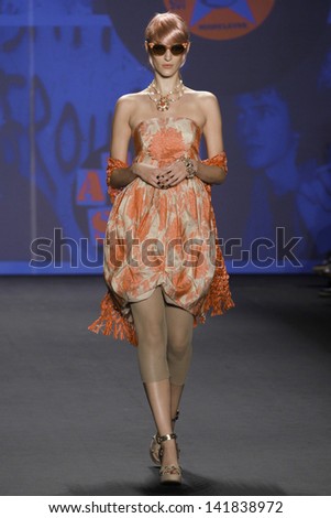 NEW YORK - SEPTEMBER 12: Model walks the runway at the Anna Sui Spring Summer 2013 Collection presentation during Mercedes-Benz Fashion Week on September 12, 2012 at Lincoln Center in New York