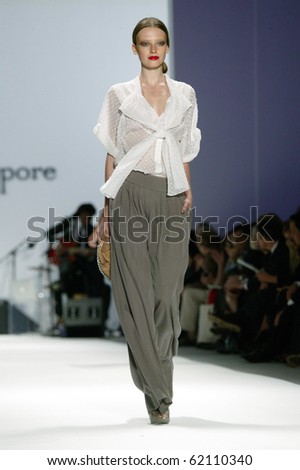 NEW YORK - SEPTEMBER 15: A model walks the runway at the Nanette Lepore collection presentation for Spring/Summer 2011 during Mercedes-Benz Fashion Week on September 15, 2010 in New York