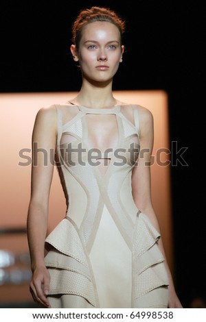 NEW YORK - SEPTEMBER 14: Jac Jagaciack walks the runway at the Herve Leger Collection presentation for Spring/Summer 2011 during Mercedes-Benz Fashion Week on September 14, 2010 in New York.
