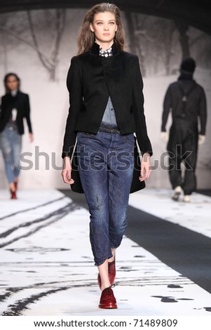 NEW YORK - FEBRUARY 12: Model walks the runway at the G-Star RAW Fall 2011 Collection presentation during Mercedes-Benz Fashion Week on February 12, 2011 in New York.