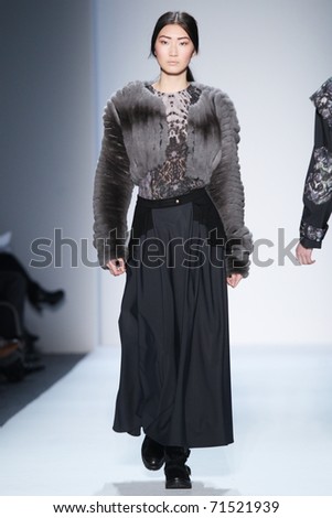 NEW YORK - FEBRUARY 16: A model walks the runway at the Christian Cota Fall 2011 Collection presentation during Mercedes-Benz Fashion Week on February 16, 2011 in New York.