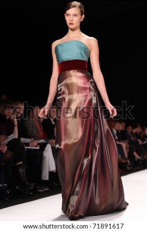 NEW YORK - FEBRUARY 14: Top model Karlie Kloss walks the runway at the Carolina Herrera Fall 2011 Collection presentation during Mercedes-Benz Fashion Week on February 14, 2011 in New York.