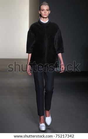 NEW YORK - FEBRUARY 17: Top model Sigrid Agren walks the runway at the Calvin Klein Fall 2011 Collection presentation during Mercedes-Benz Fashion Week on February 17, 2011 in New York.