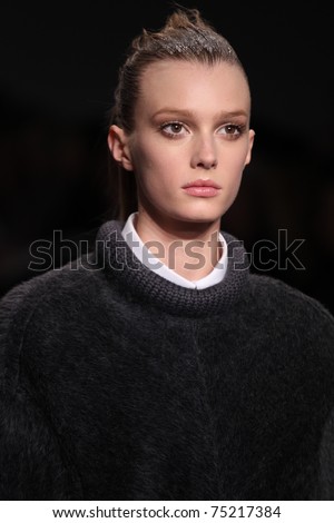 NEW YORK - FEBRUARY 17: Top model Sigrid Agren walks the runway at the Calvin Klein Fall 2011 Collection presentation during Mercedes-Benz Fashion Week on February 17, 2011 in New York.