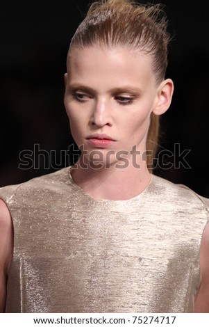 NEW YORK - FEBRUARY 17: No. 1 Ranked top model Lara Stone walks the runway at the Calvin Klein Fall 2011 Collection presentation during Mercedes-Benz Fashion Week on February 17, 2011 in New York.