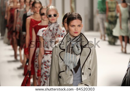 NEW YORK SEPTEMBER 12 Models walk the runway at the Carolina Herrera S S 2012 collection presentation during Mercedes-Benz Fashion Week on September 12 2011 in New York. NEW YORK SEPTEMBER 12 Models walk the runway at the Carolina Herrera S S 2012 collection presentation during Mercedes-Benz Fashion Week on September 12 2011 in New York.