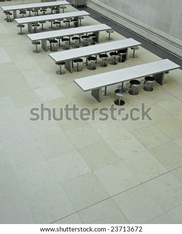 Tables at a cafe in the Great Court at the British Museum in London, UK