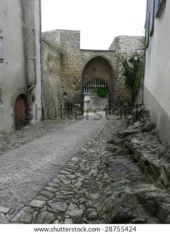 Castle entrance gate on the edge of the medieval town of Le Dorat in France