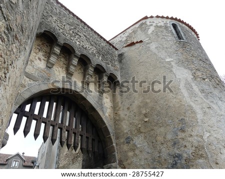 Castle entrance gate on the edge of the medieval town of Le Dorat in France