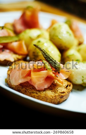 smoked salmon toasts with potatoes with dill