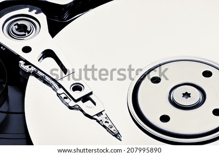 opened hard disc drive in closeup view