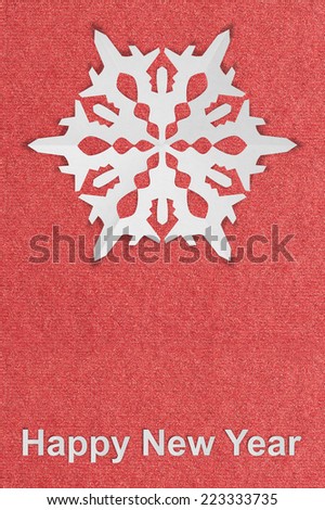 new year vintage textured paper postcard with true paper snowflake and text: happy new year