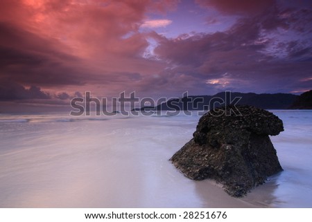 Landscape of a beautiful beach with red skies at Perhentian Island, Malaysia