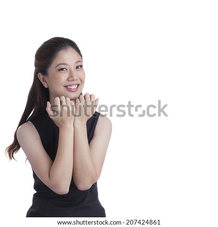 Nervous scared xwoman biting her nails. Funny asian businesswoman isolated in full length on white background. Mixed caucasian / chinese model.