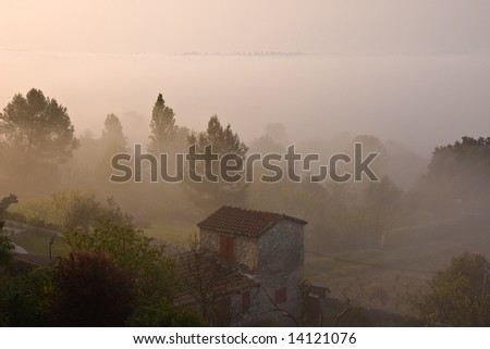Early morning fog in the valley.  Seillon Source d\'Argens, Provence, France.
