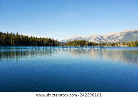 Mirror Image Mountains Reflected in Lac Beauvert, Jasper, Alberta, Canada - UNESCO World Heritage