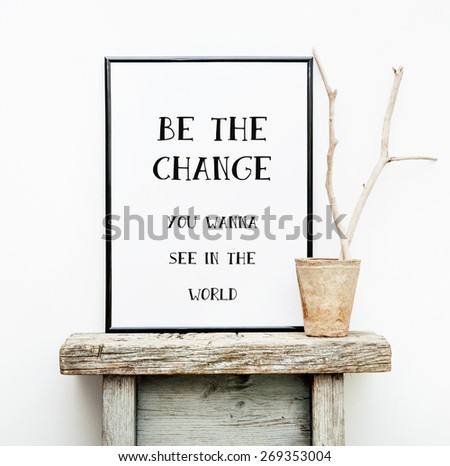 Motivational frame BE THE CHANGE. Hipster scandinavian style room interior