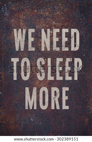 Motivational poster over rusty metal WE NEED TO SLEEP MORE. Hipster scandinavian design
