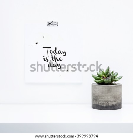 Scandinavian interior design. Hipster motivational set with  succulent in concrete planter. Note paper on the wall with quote TODAY IS THE DAY.