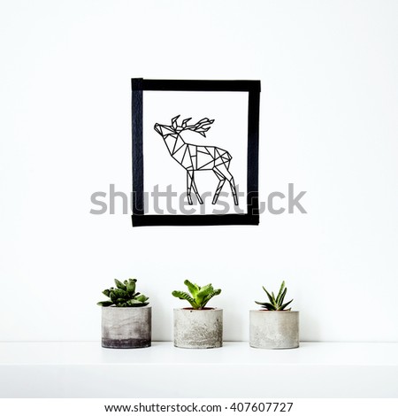 Scandinavian interior design. Hipster motivational set with cactus and succulents in concrete pot. Washi tape wall decoration. Geometric  deer.