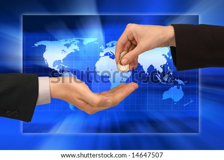 business people passing coins against world map