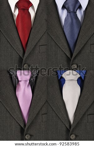 four business suits with different colored shirts and ties