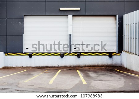 Storage door for unloading cargo, can be used as industrial background