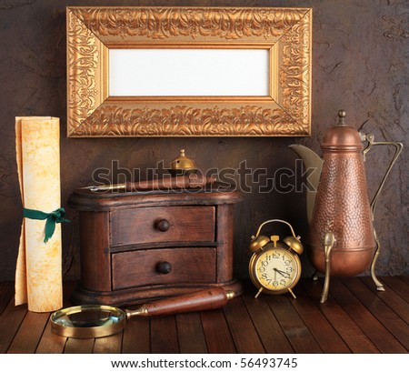 Picture gold frame with ancient subjects. Still-life.