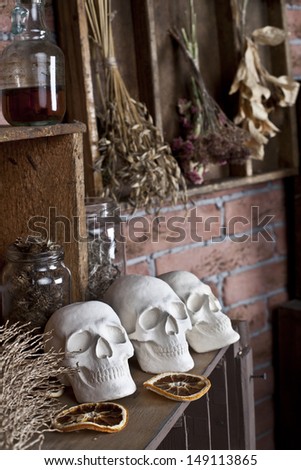 three skulls in the kitchen witch