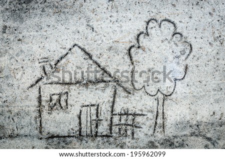 close up to house  drawing on sand