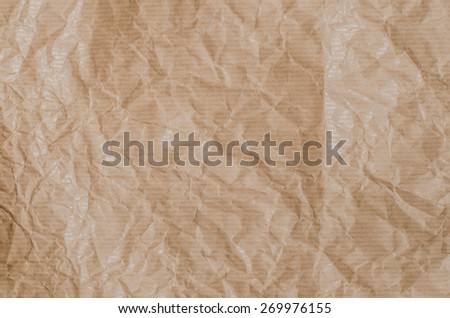 closeup to creased brown paper texture background