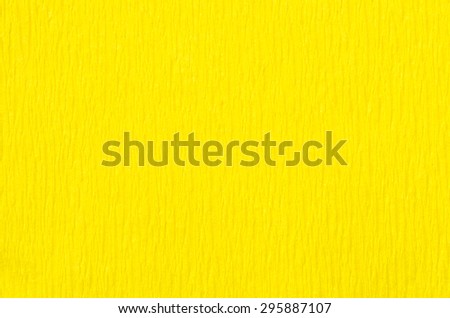 detail of yellow  crepe paper texture background