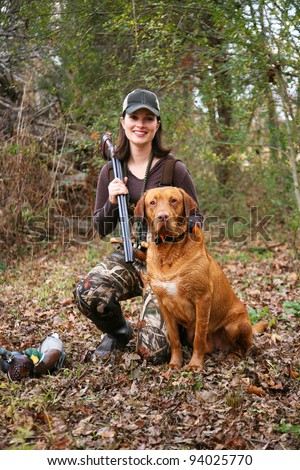 Woman Duck Hunter Portrait with Labrador and Decoys