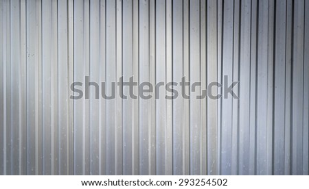 grunge Aluminum corrugated Ribbed background texture with light from corner