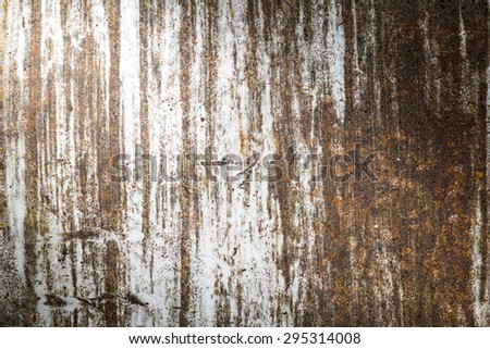 grunge rusty metal texture background with light from corner