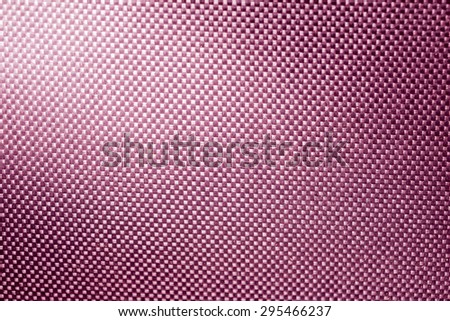 pink fabric nylon background texture with light from corner