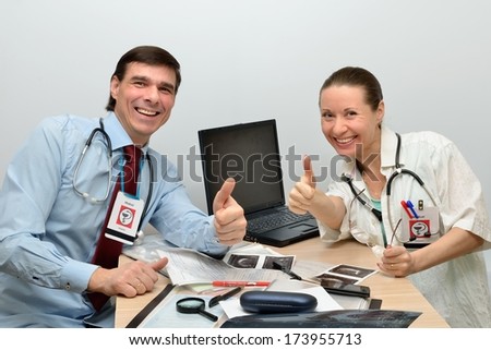 Doctors happy with a successful result.