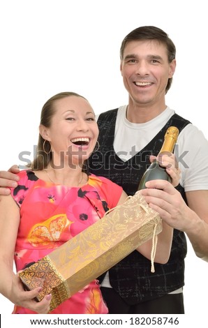 Woman and man rejoice the gift of expensive champagne
