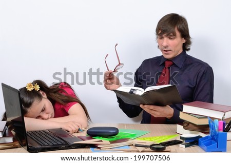 Teen schoolgirl tired and asleep when the teacher reads the book