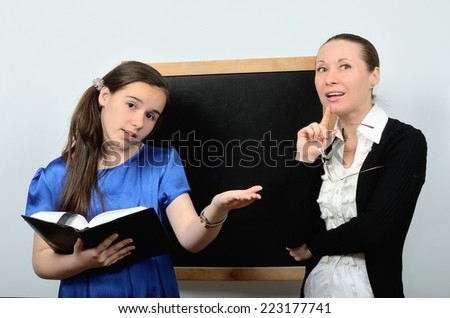 Woman teacher listens to the story of a teenage schoolgirls at the school board