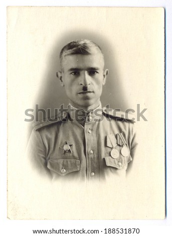 USSR - CIRCA 1946: Portrait of a Soviet Army  lieutenant who was awarded the Order of the Red Star and two medals, circa 1946