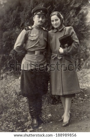 USSR - CIRCA 1950: Vintage photo shows soviet army sergeant and his wife, CIRCA 1950