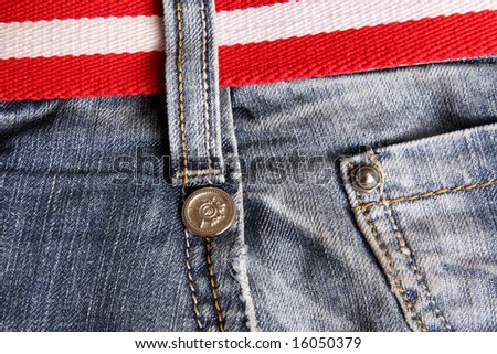 Fashion jeans with striped red and white belt