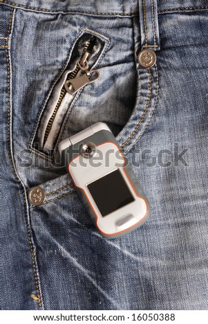 Cell phone in the jeans pocket, fashion, blue
