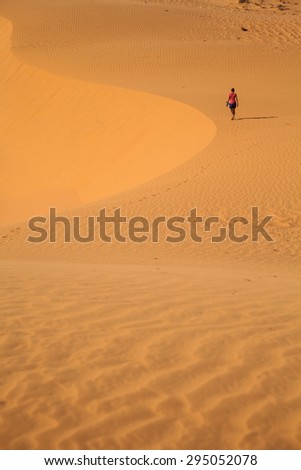 Traveller, one or more people in the desert, sand, dunes