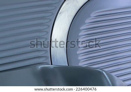 Close up of a professional slicer used in restaurant kitchen
