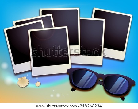 Summer like old style empty photo cards lying on a sea sand and framed with shells. Sunny summer background.