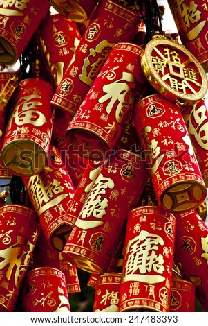 Firecracker decorations for Chinese New Year celebration, says good fortune, welcome treasures
